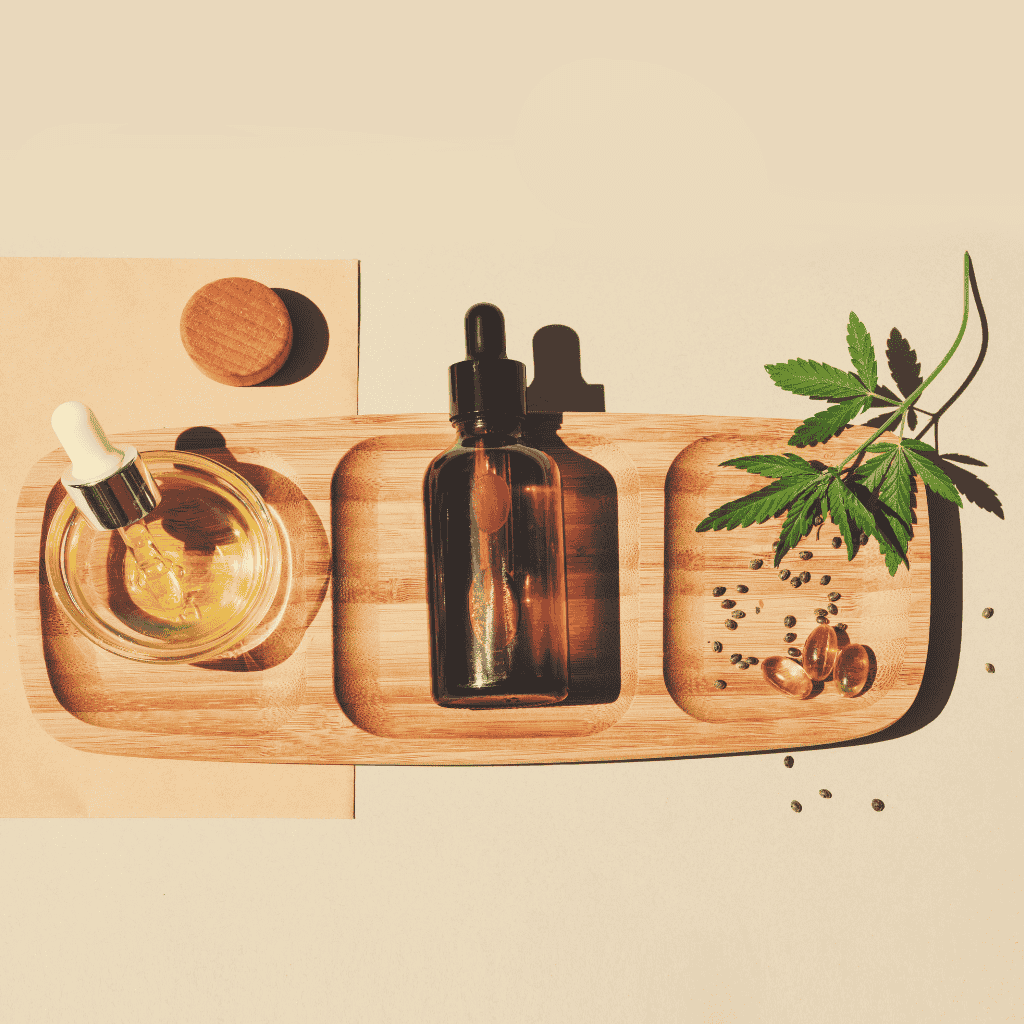 A wooden panel with various CBD products